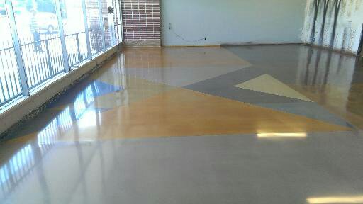 concrete overlay with different stain colors
