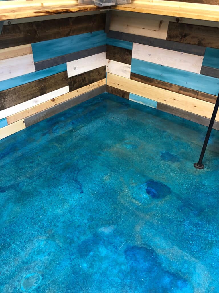 aqua blue dye on concrete floor polish